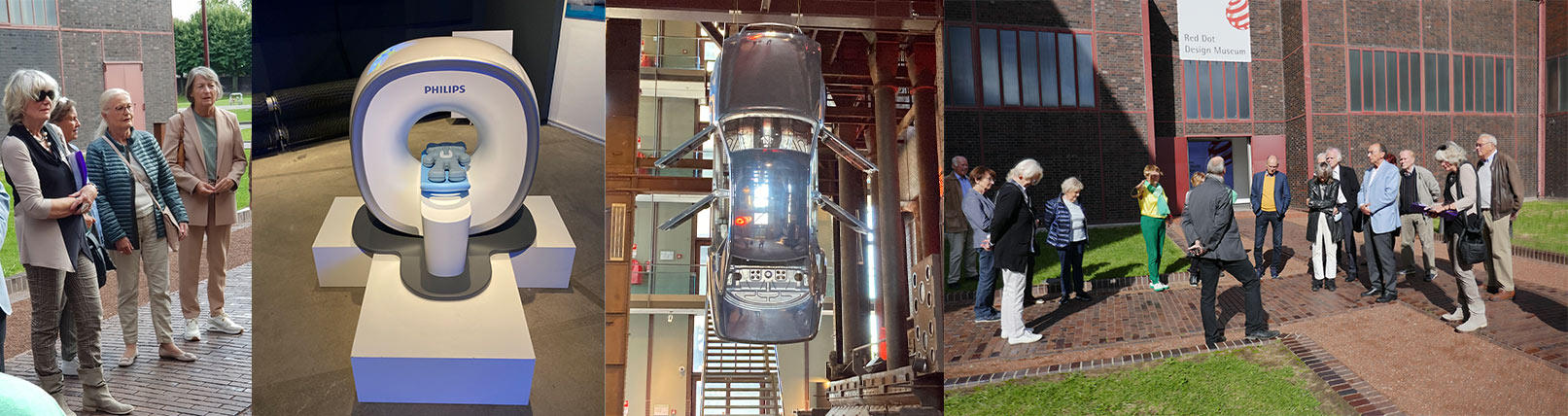 Impressionen aus dem Red Dot Museum - Die Teilnehmer der Exkursion ein Auto welches mit der Motorhaube nach oben aufgehangen wurde